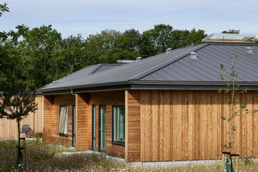 Homes and facilities for autistic residents, clad in wood and steel profiles, and surrounded by forest, AutismeCenter Skive, Jægervej 16, 7800 Skive